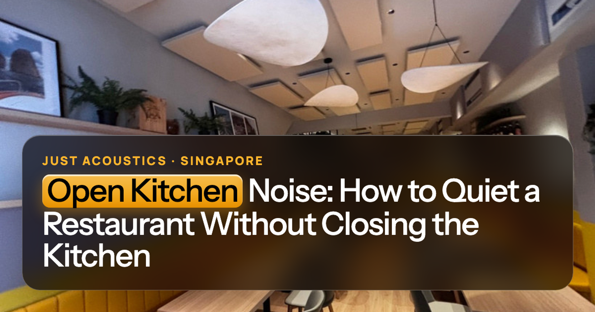 Open restaurant space with ceiling acoustic panels