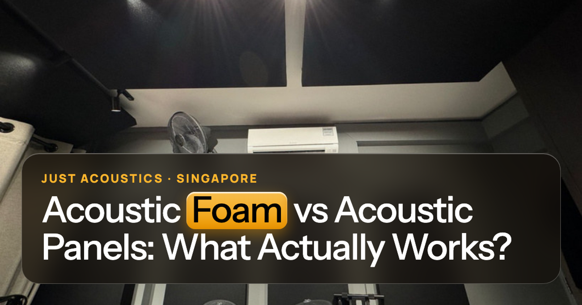 Dark fabric acoustic panels in a home music studio