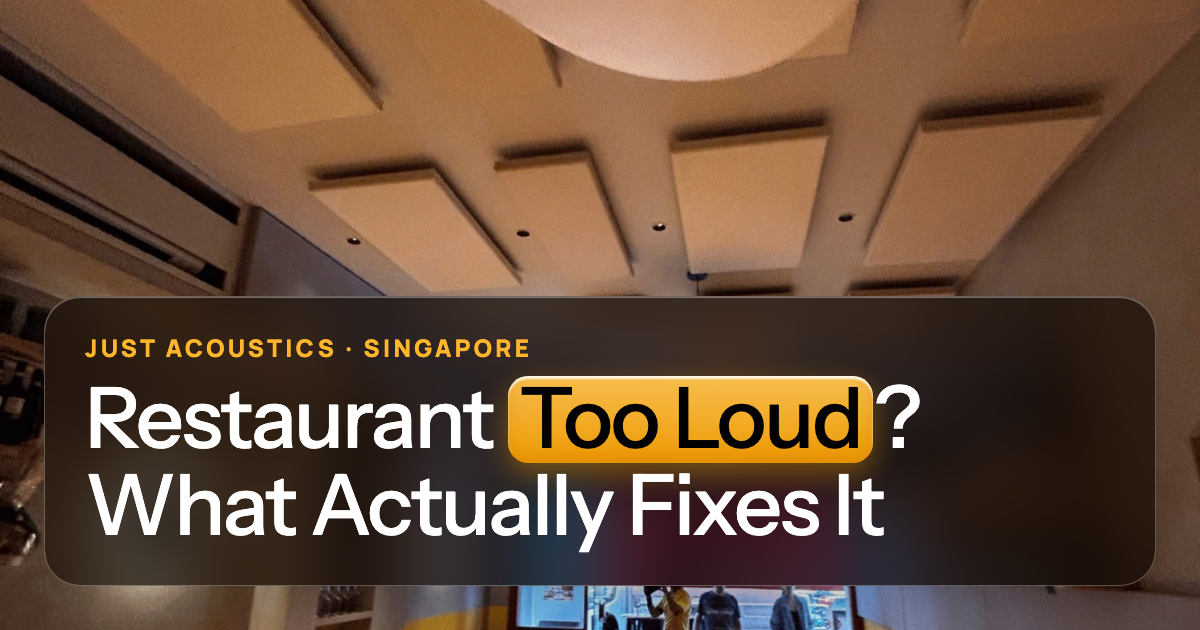Busy Singapore restaurant dining room with ceiling acoustic panels