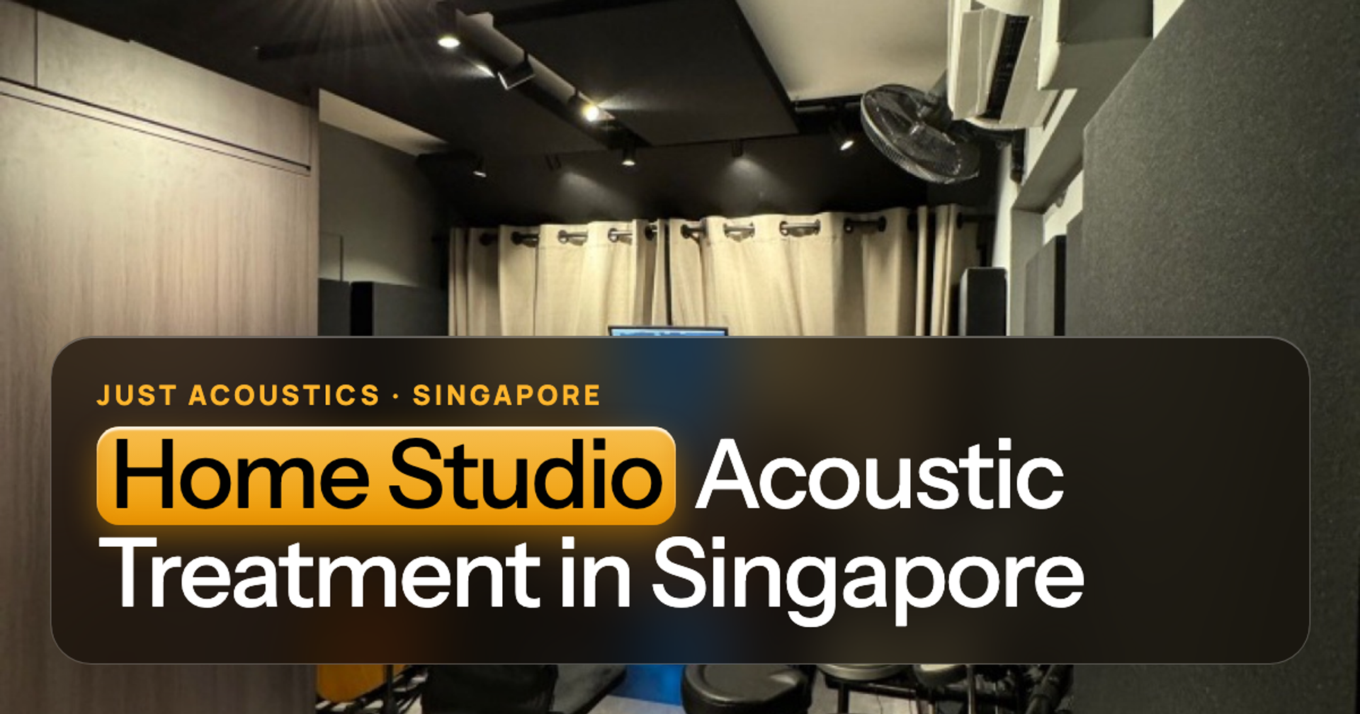Home music studio in Singapore with acoustic panels and a mixing desk