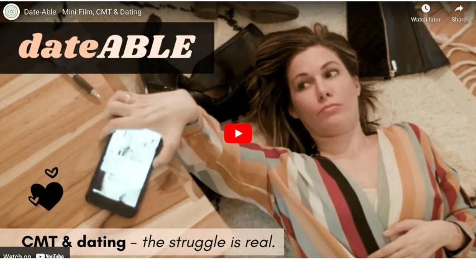 Woman lying on floor holding phone with dateABLE logo and text about CMT and dating struggles.