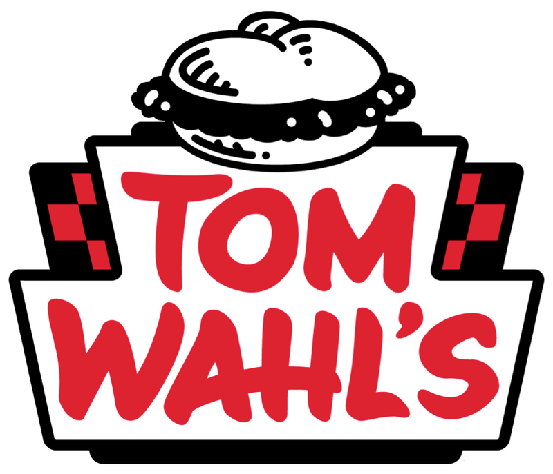 Tom Wahl's restaurant logo featuring a hamburger on red and black banner with checkered flags.