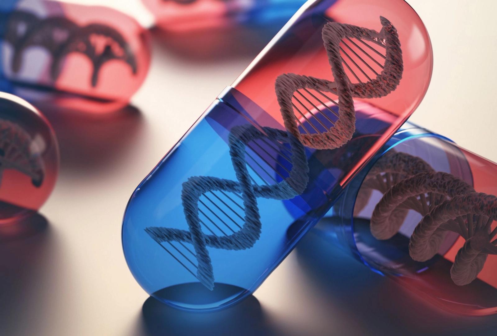 Cápsulas translúcidas que contienen modelos de doble hélice de ADN en tonos azules y rojos.