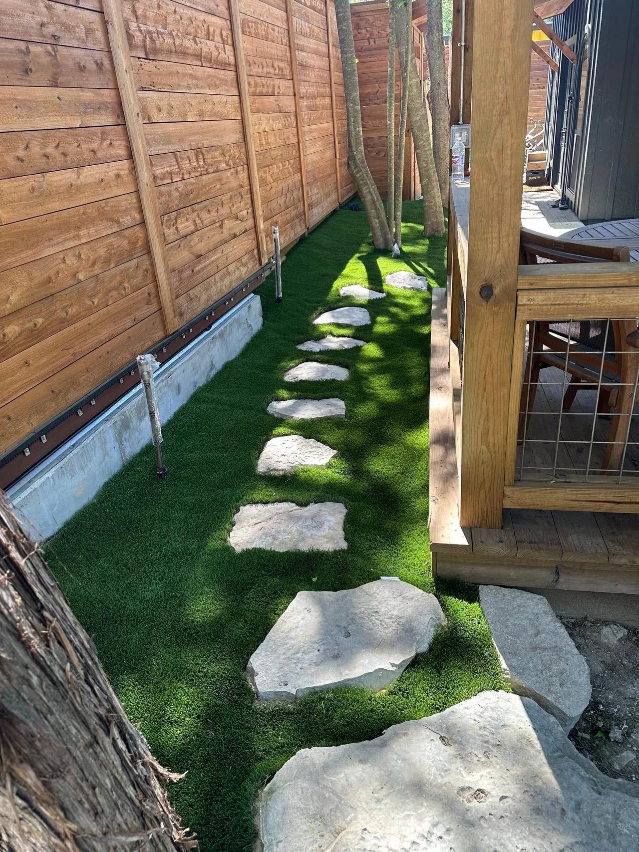 Stone path with artificial grass