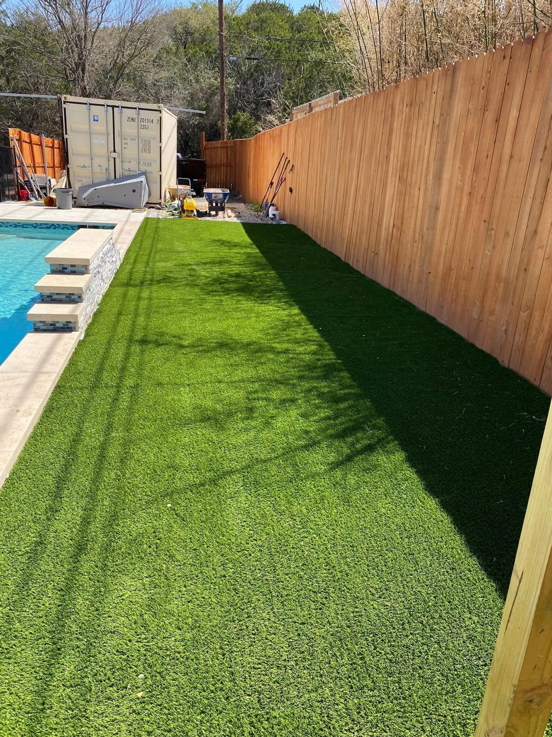 Side yard with artificial turf