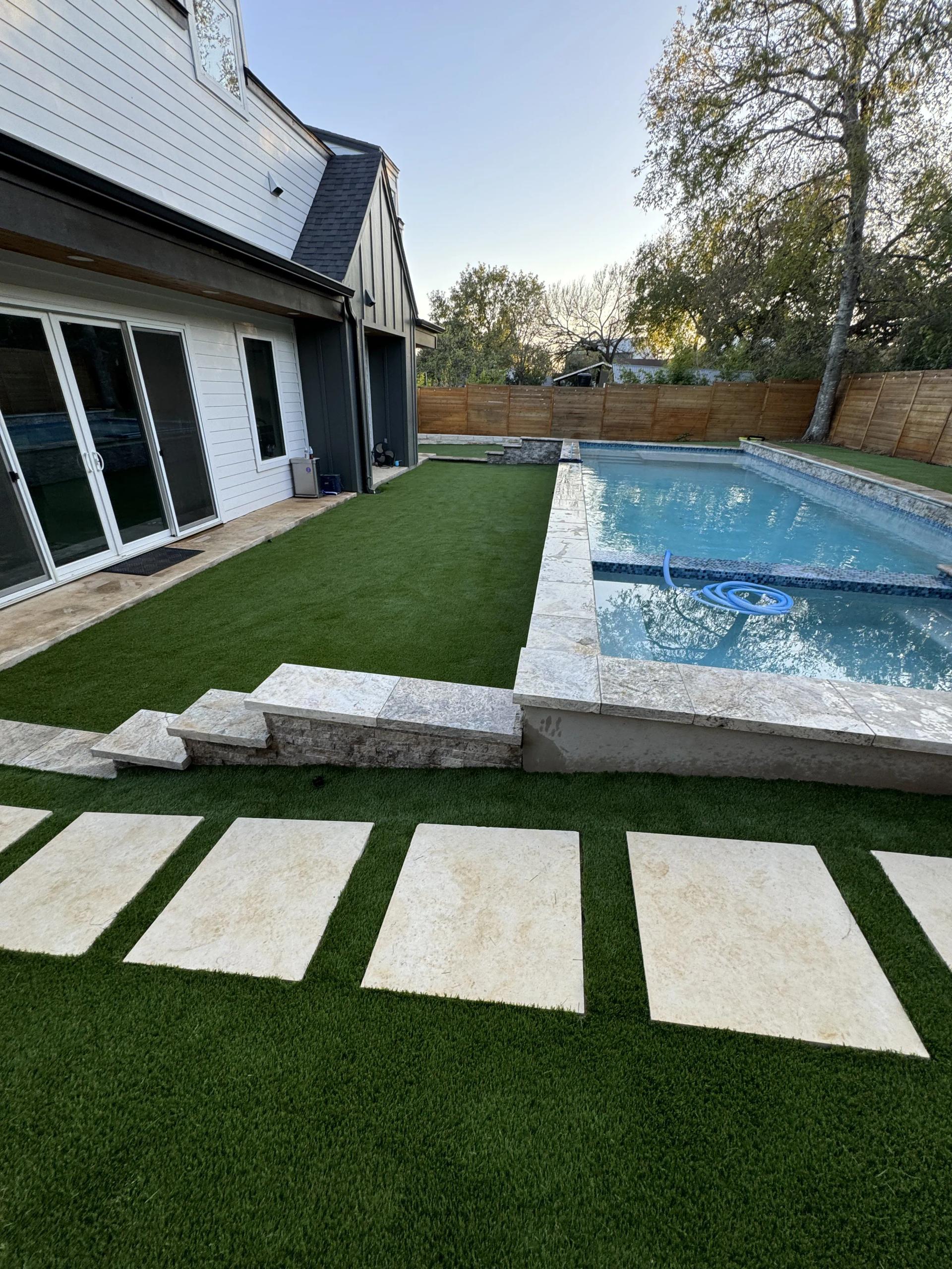 Artificial turf lawn with garden edging