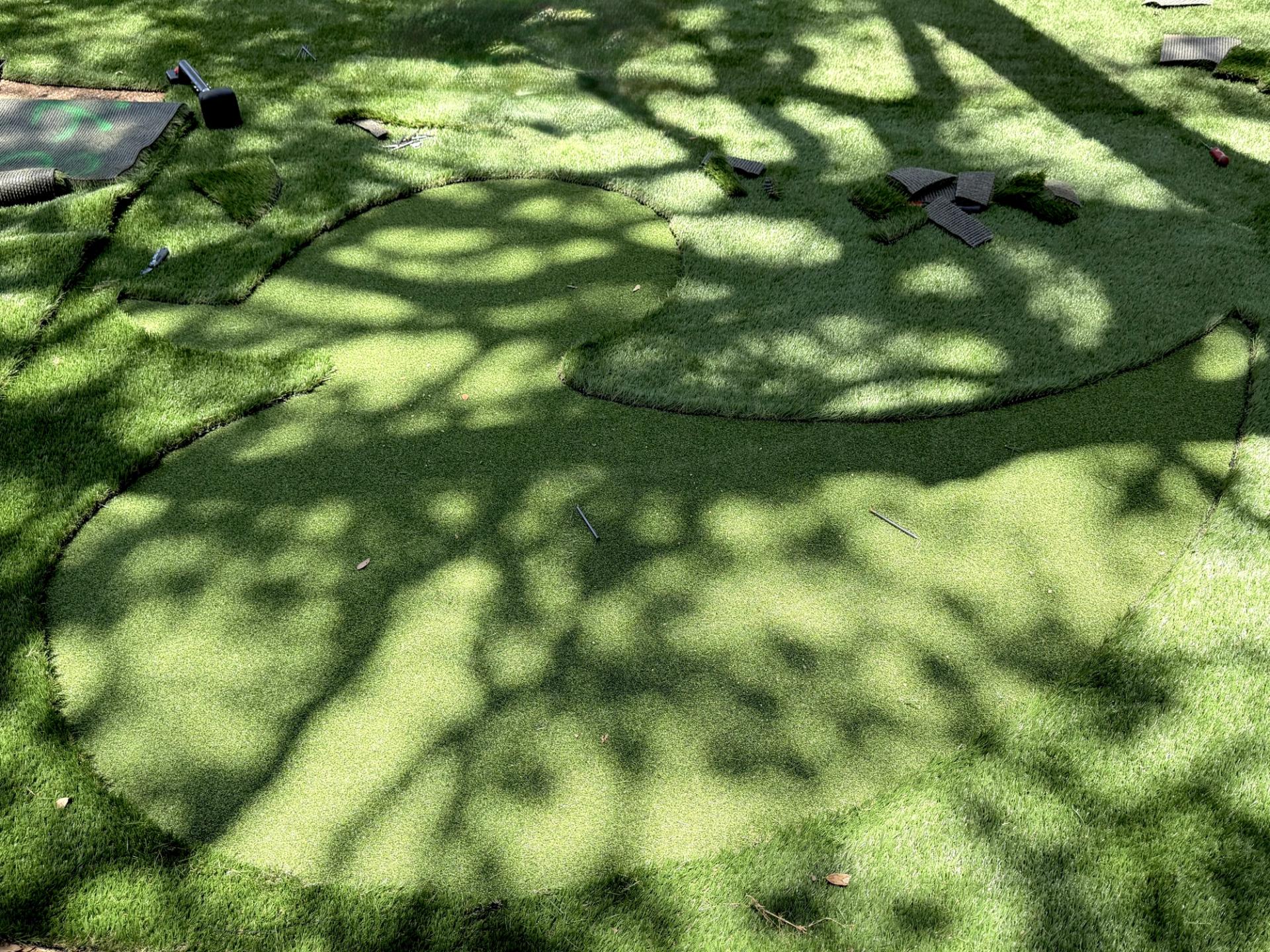 The Lucky Duck entrance has the logo of a duck outlined in the turf.