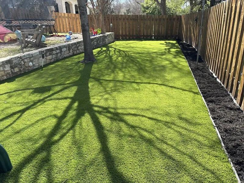 Artificial turf grass in a kids backyard