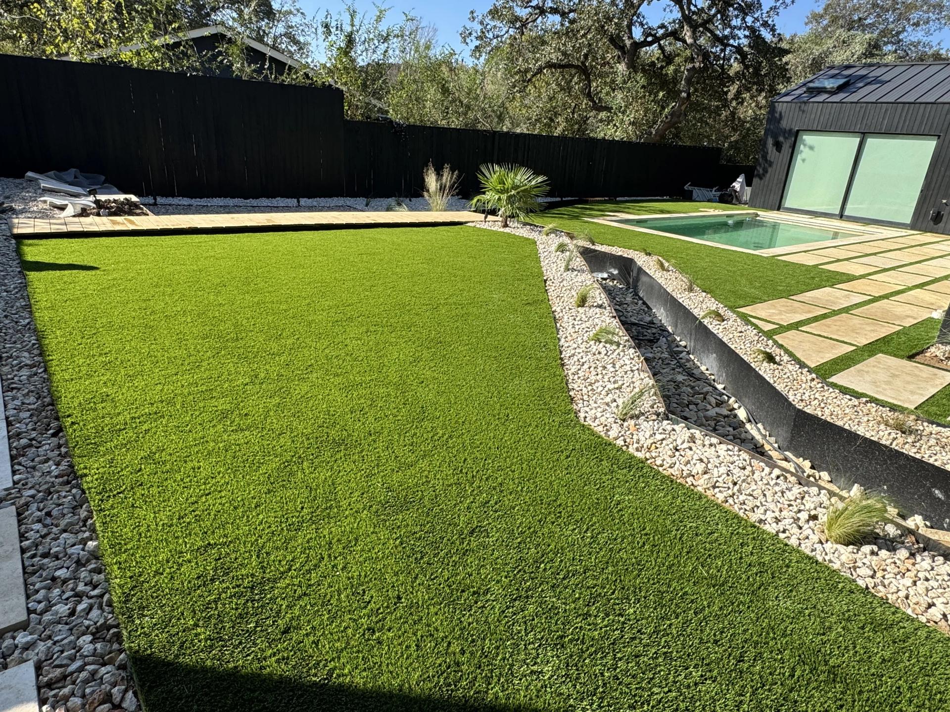 Artificial turf with a stepping stone walkway