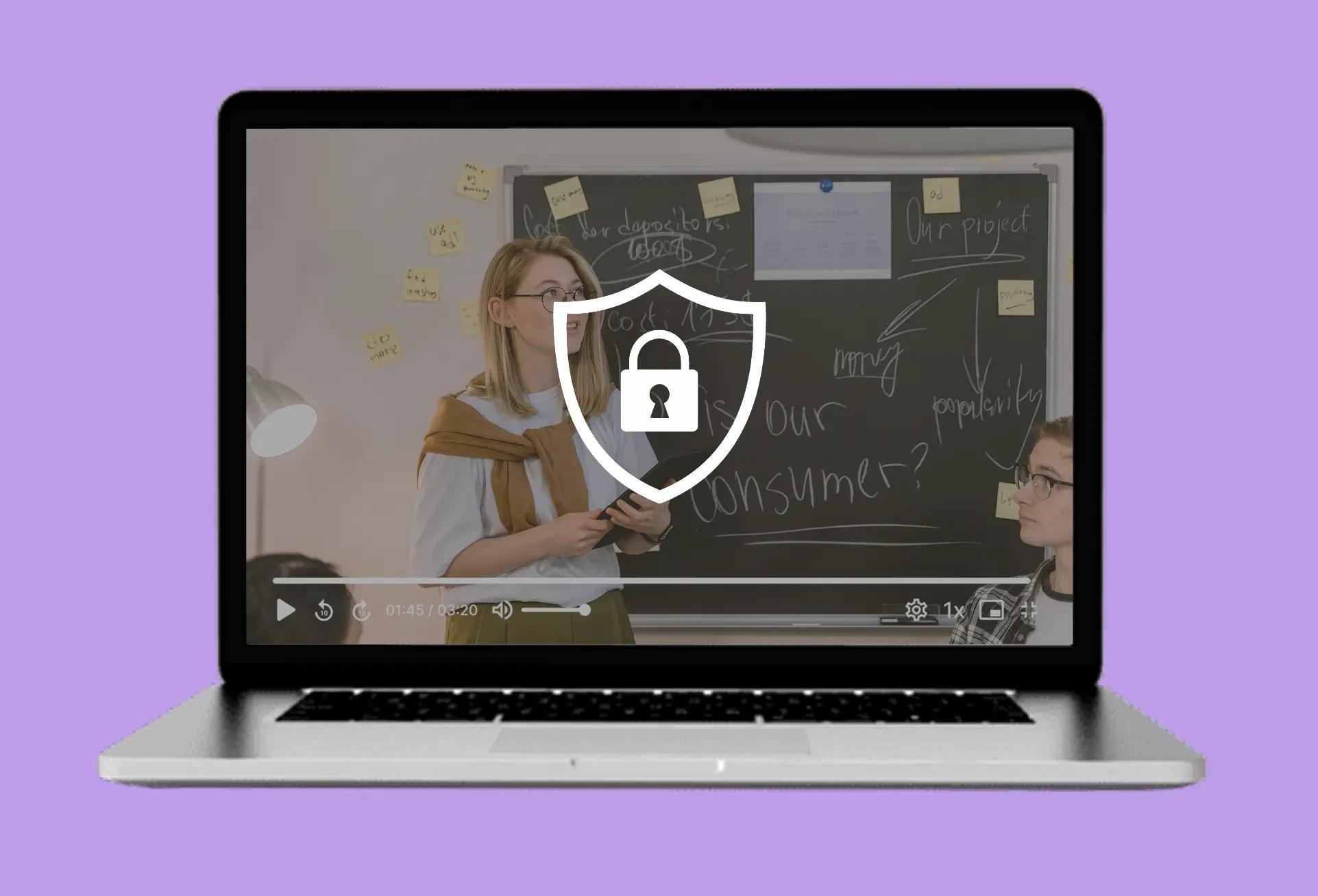 A protected course video with DRM shield on a laptop