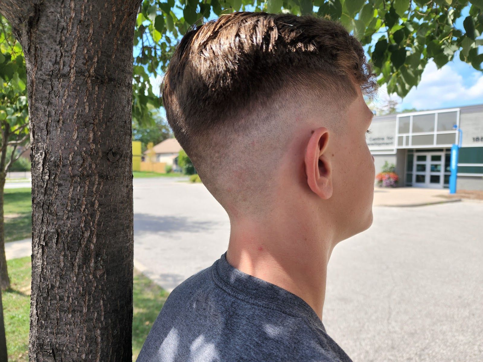 West Side Barber Shop, mechanic at work
