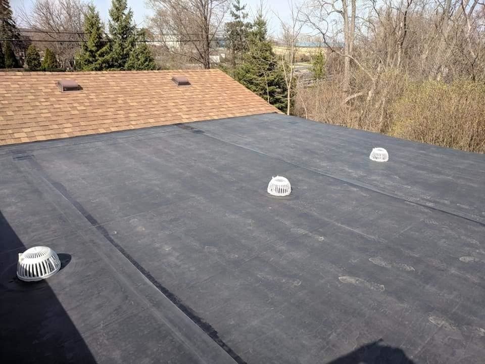 Al-Can Roofing, mechanic at work