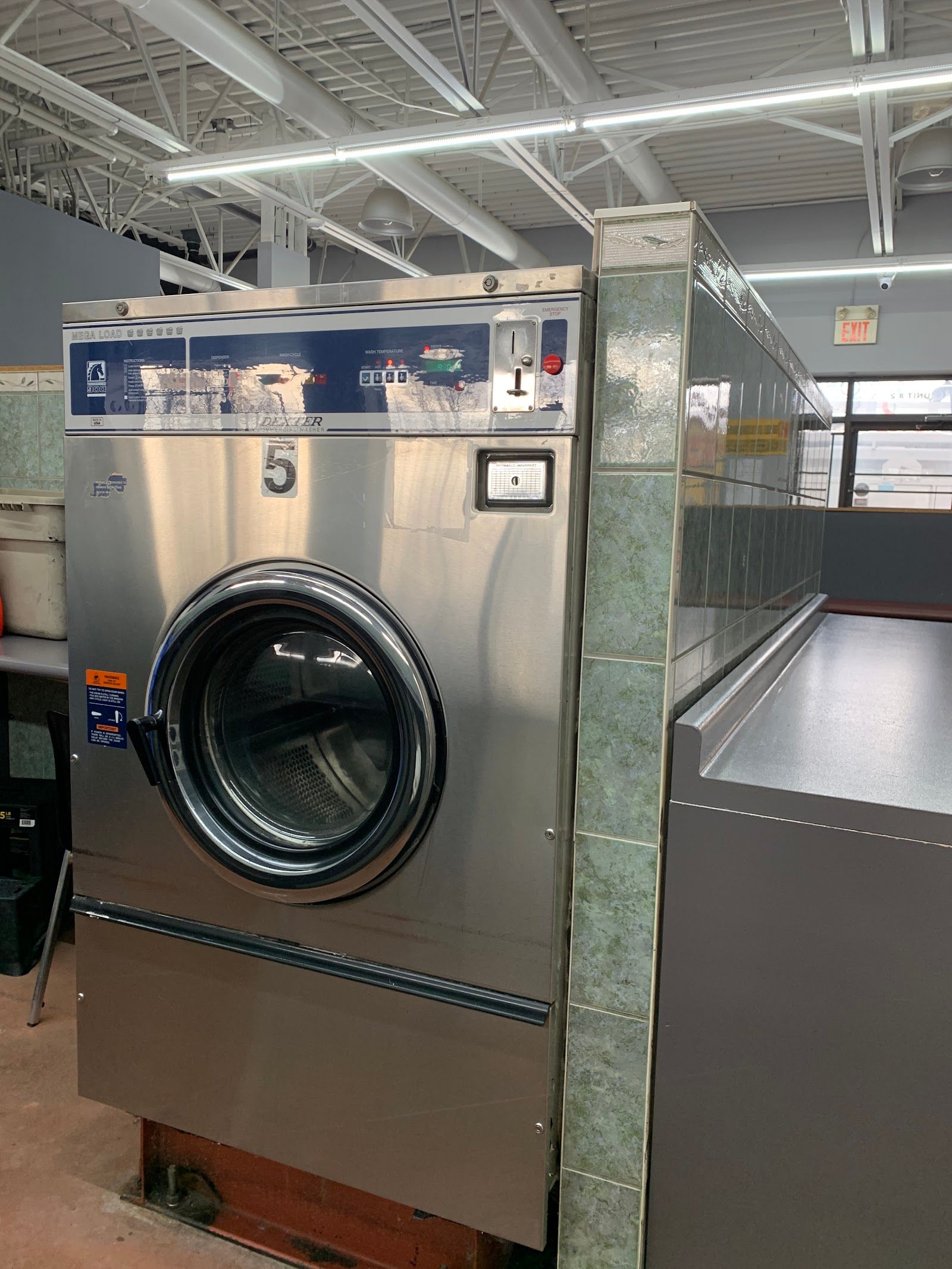 Wash And Roll Coin Laundromat, mechanic at work