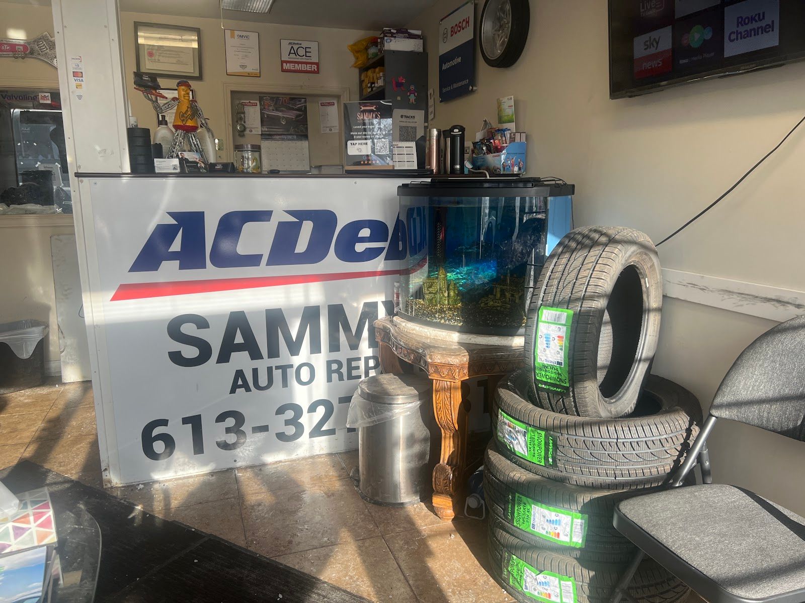Sammy's Auto Repair Centre, mechanic at work