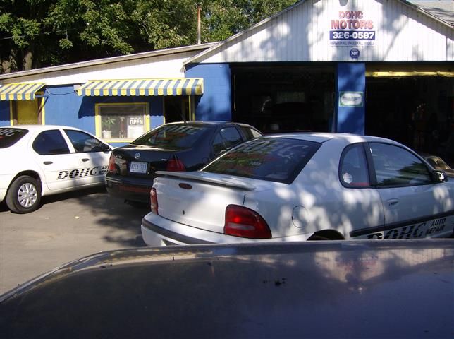 DOHC Motors Auto Repair, mechanic at work