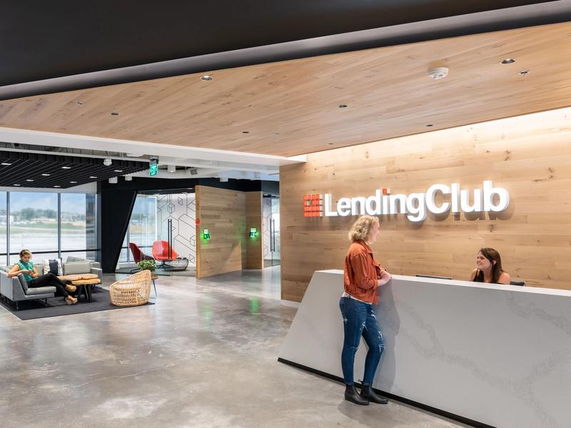 Women speaking at Lending Club Bank reception desk