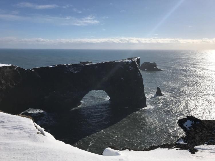 rock arch in ocean