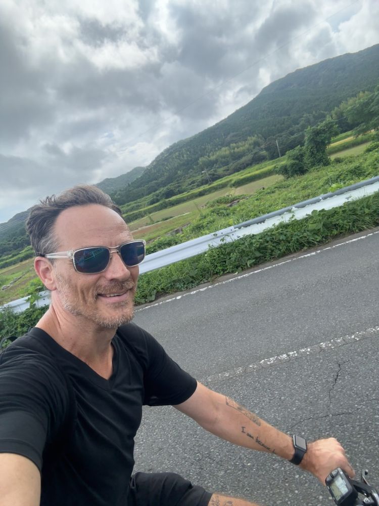 man taking selfie on bike