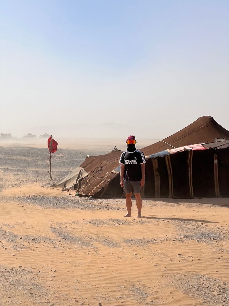 man in desert camp