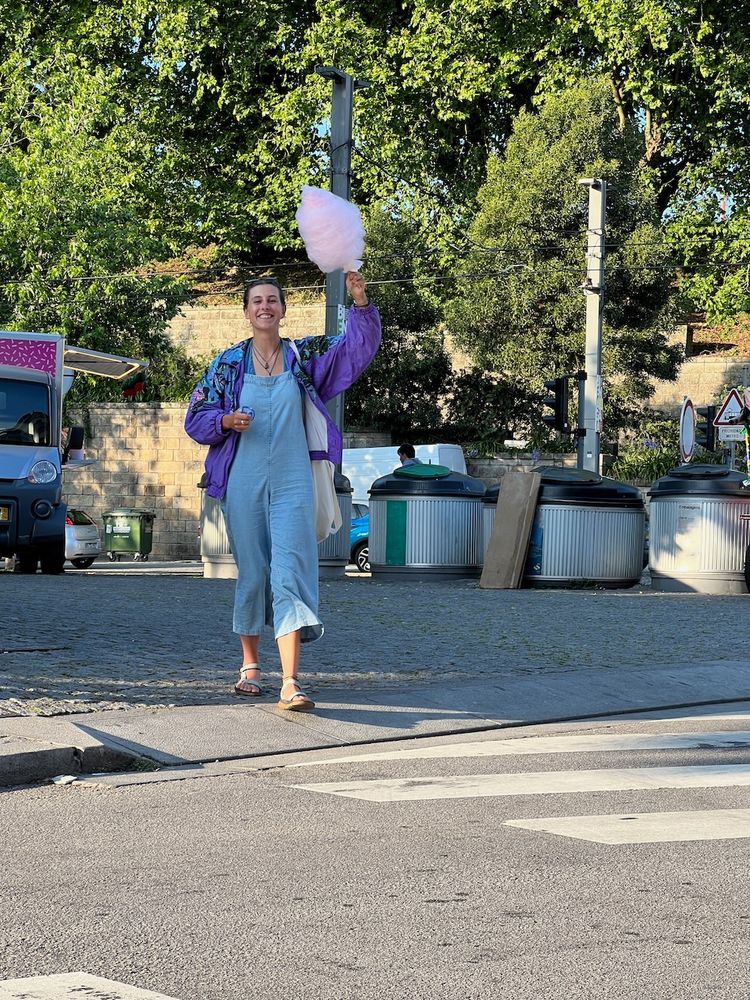 person walking with cotton candy
