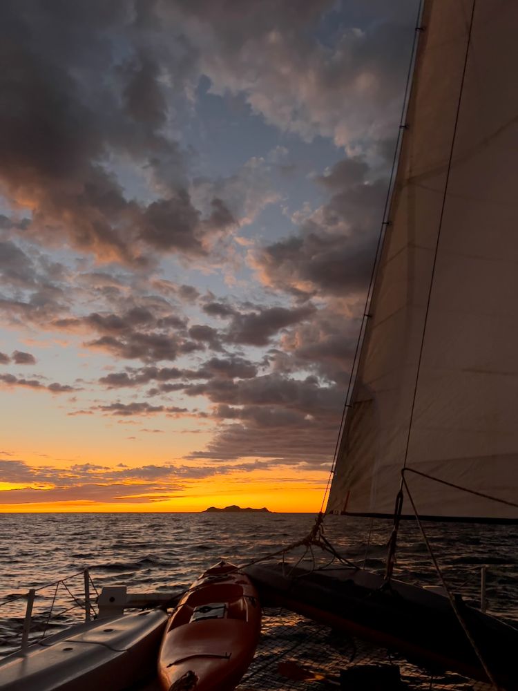 sunset on a sail boat