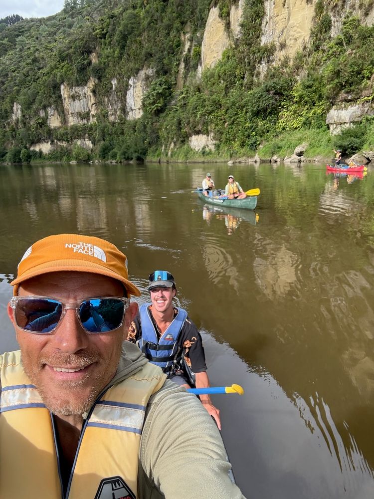 group canoeing river