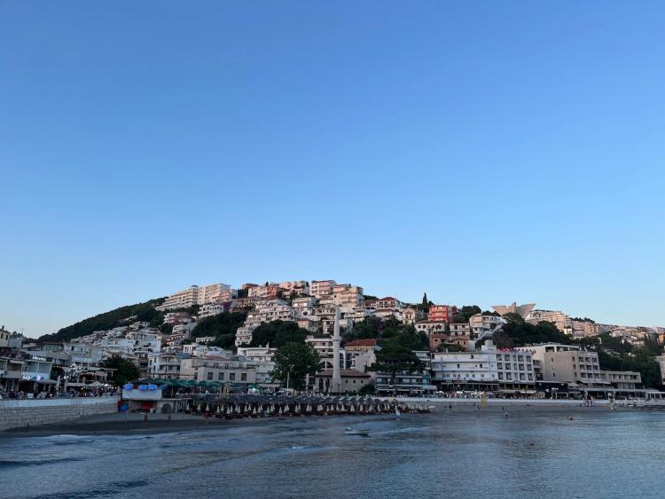 town on a hill from bay