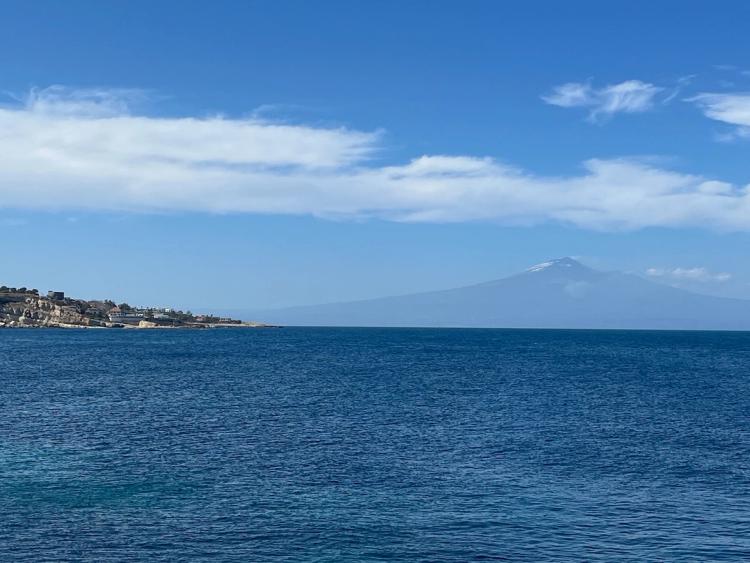 mt. etna from across water