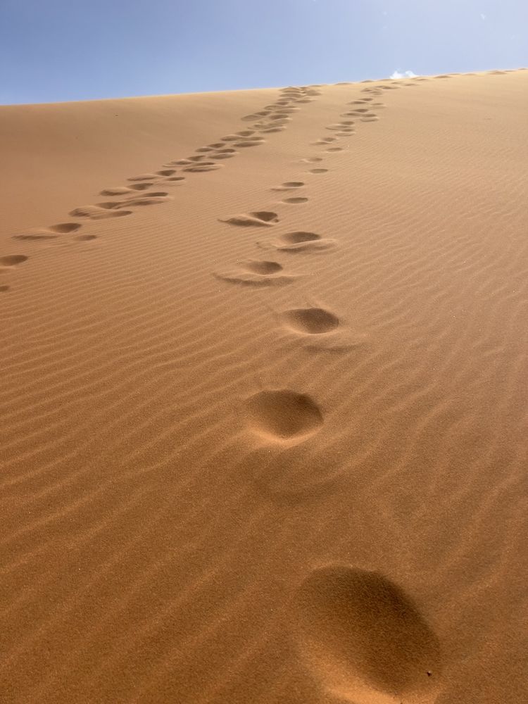 footsteps in sand