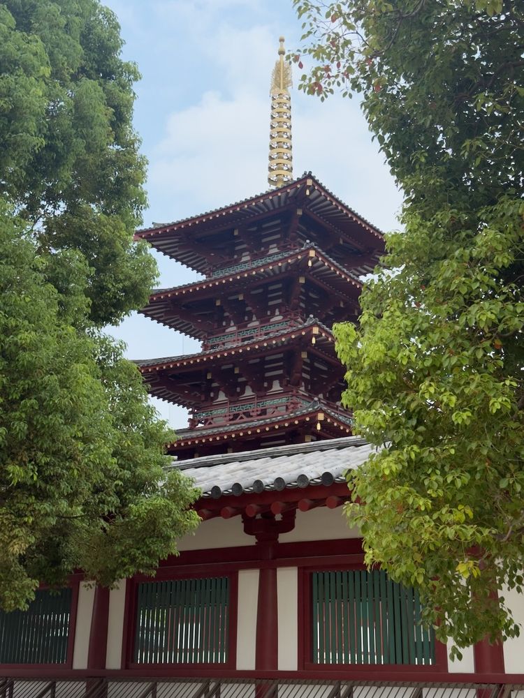 view of temple between two trees
