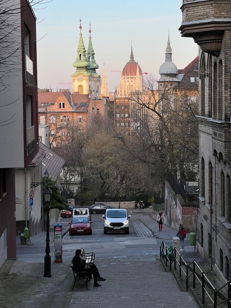 historic spires from narrow street