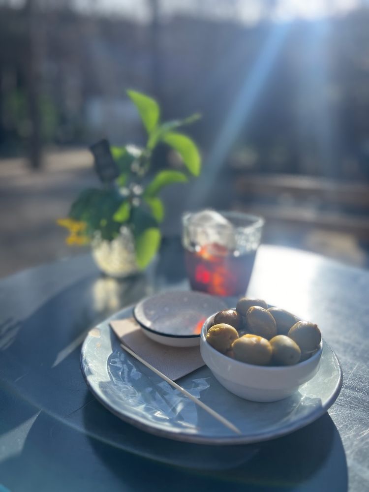 sunlit drink and snack