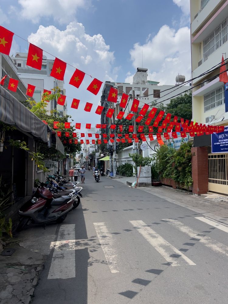 flags hanging over street