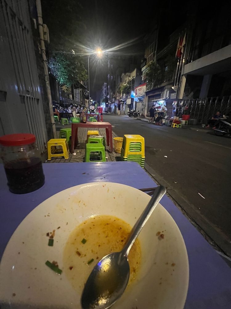 empty food bowl on table at side of street