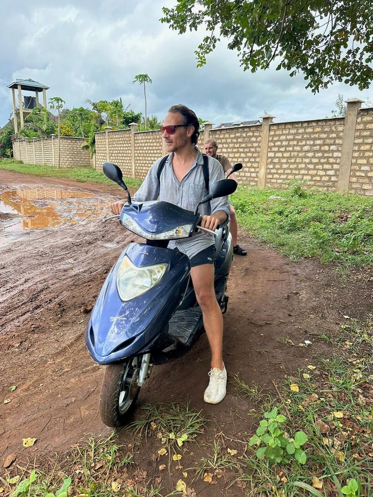 man on scooter