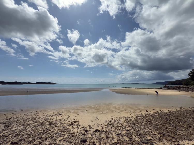 wide angle of beach and clouds