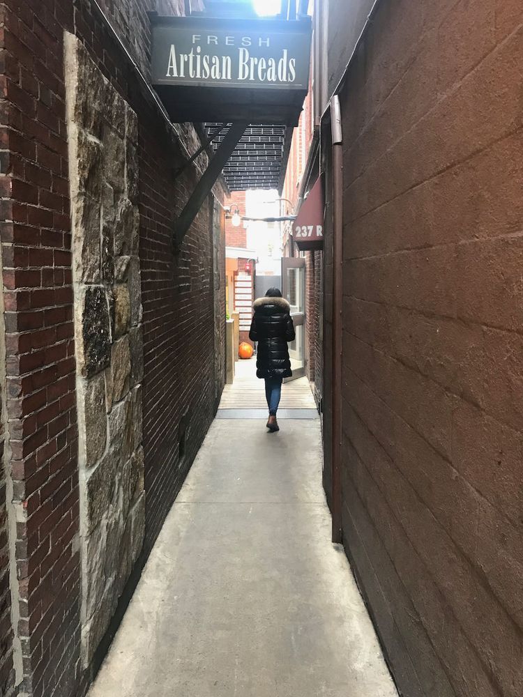 walking down a back alley
