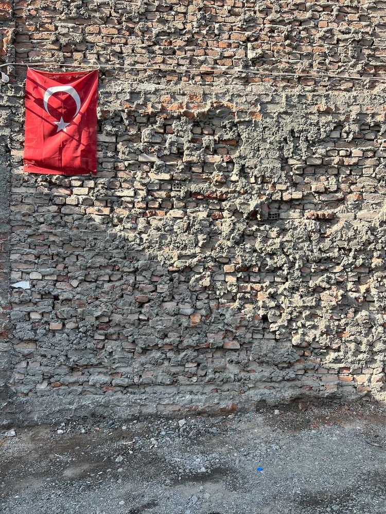 Turkish flag on brick wall