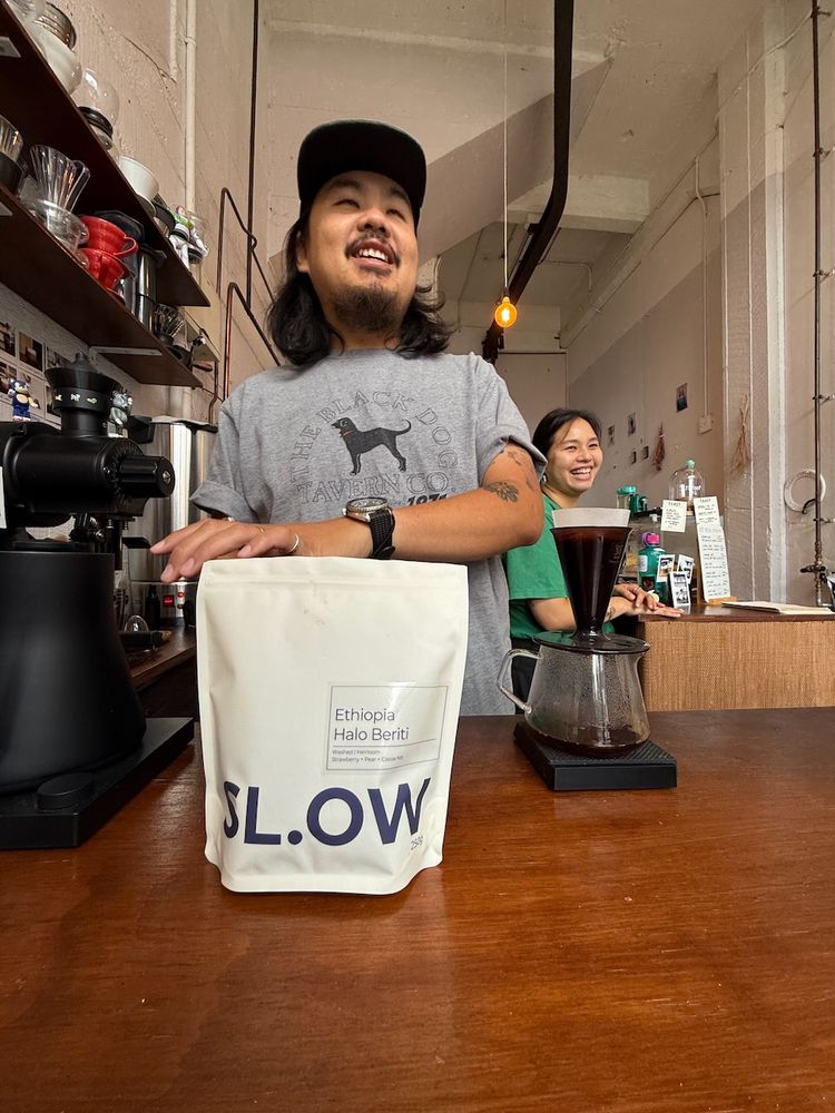 people smiling in coffee shop