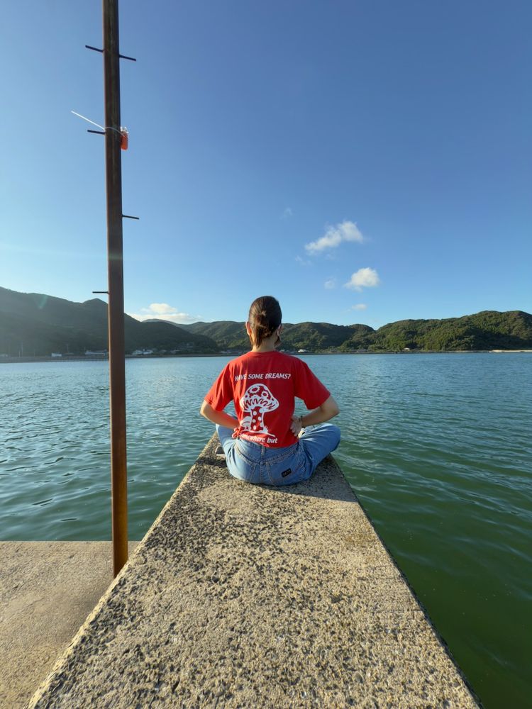 woman on edge of pier
