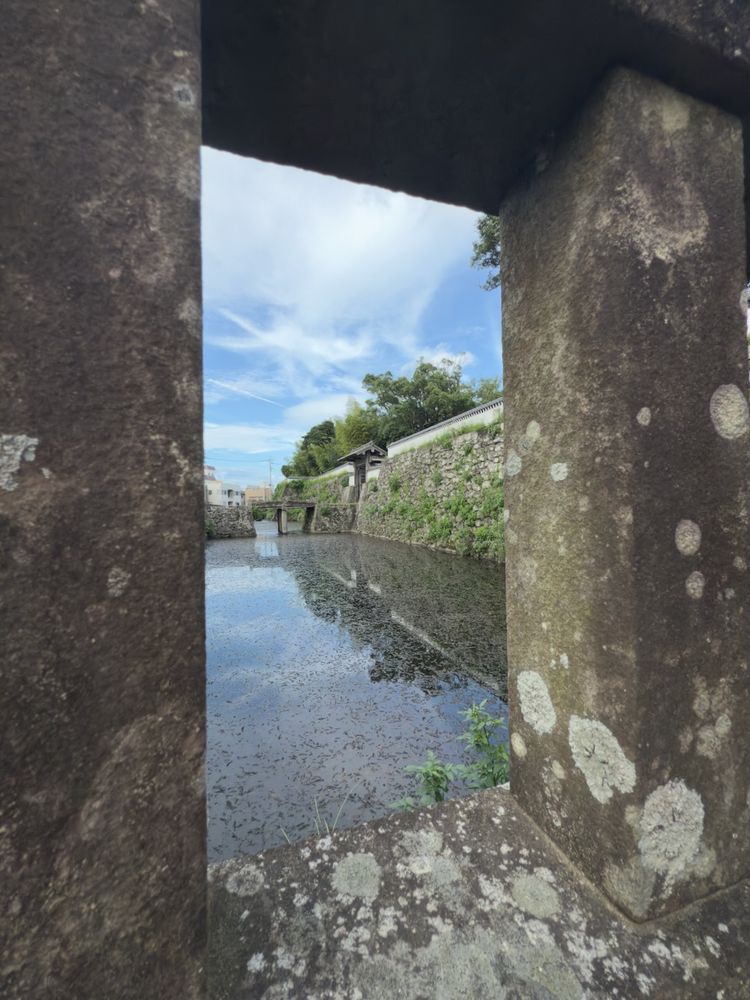 castle moat through hole in wall