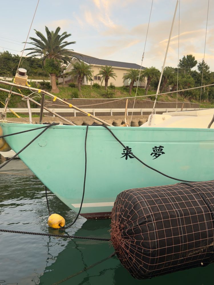 boat anchored in harbor