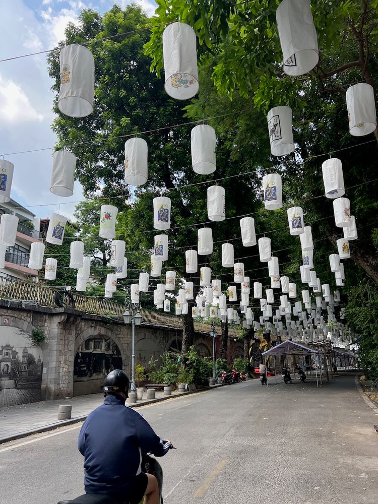 laterns hanging above street