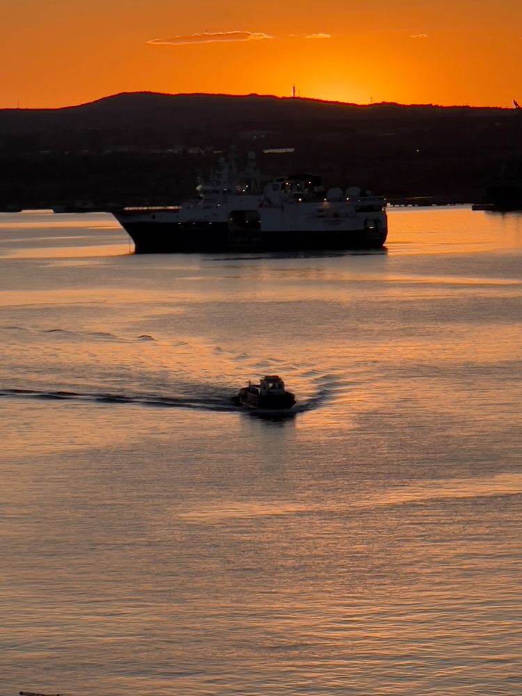 boat silhouette at sunset