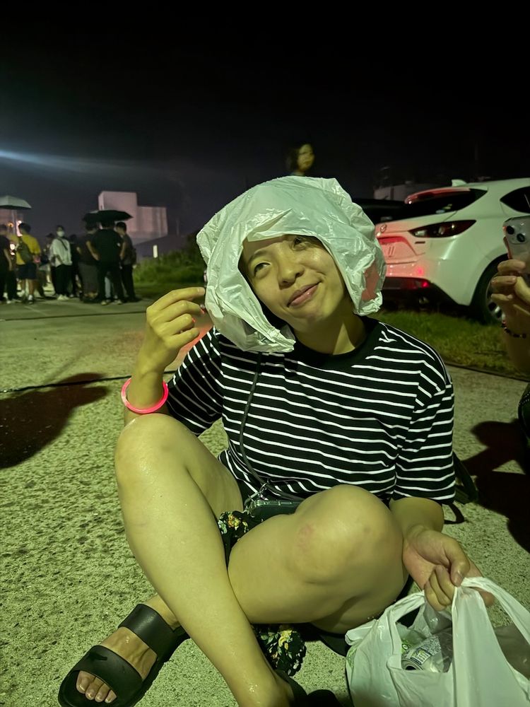 woman with bag on her head