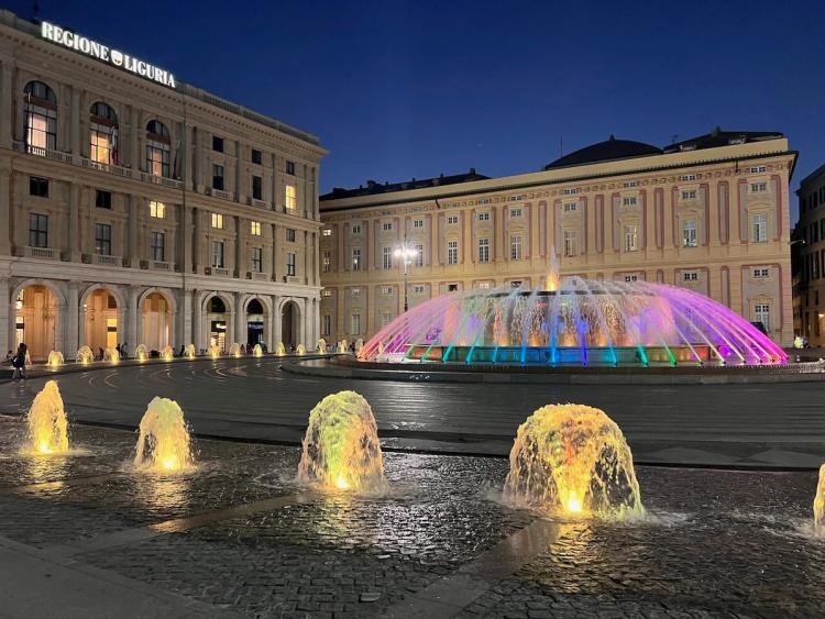 multi-colored fountain at night