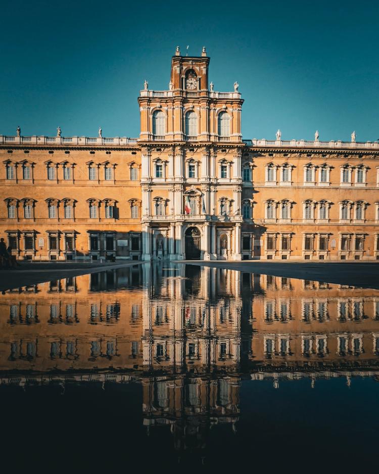 building reflected in water