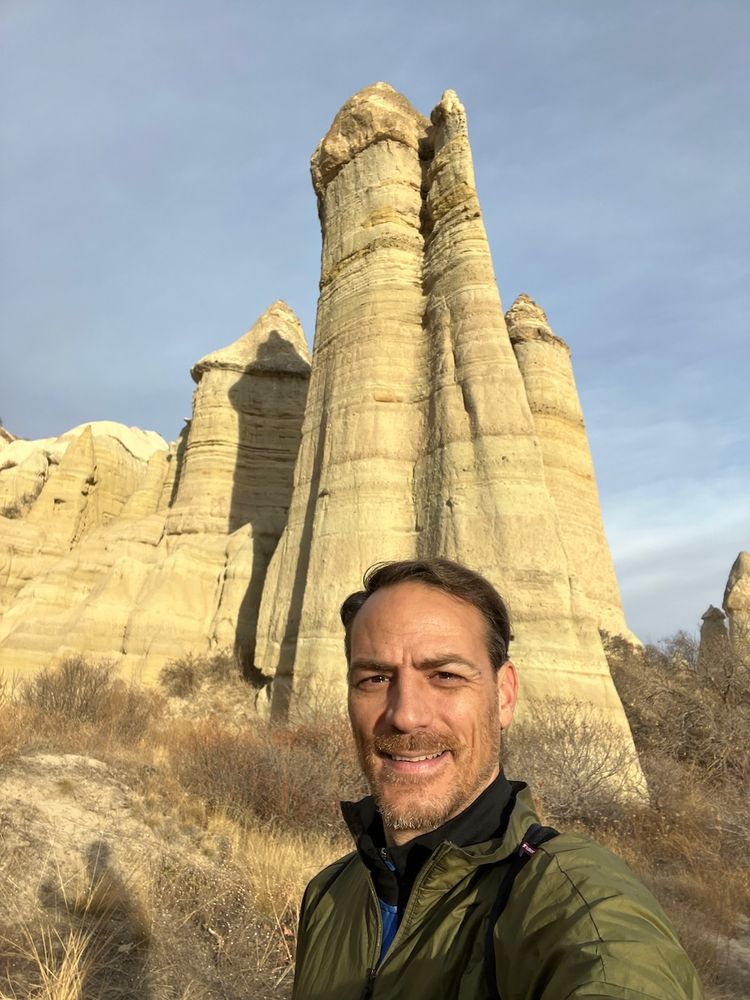 selfie in front of rock columns