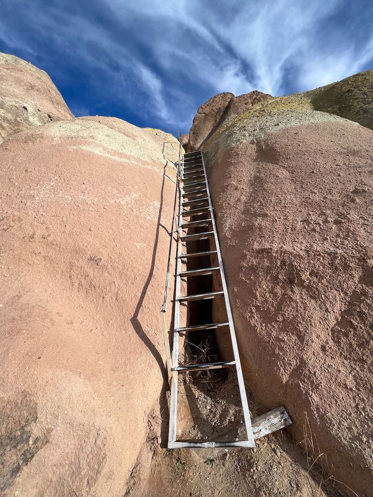 old ladder up rock face