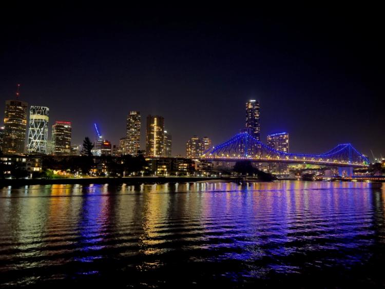 city colors reflecting on river